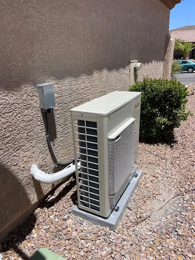Residential air conditioning condenser unit in Woodfin